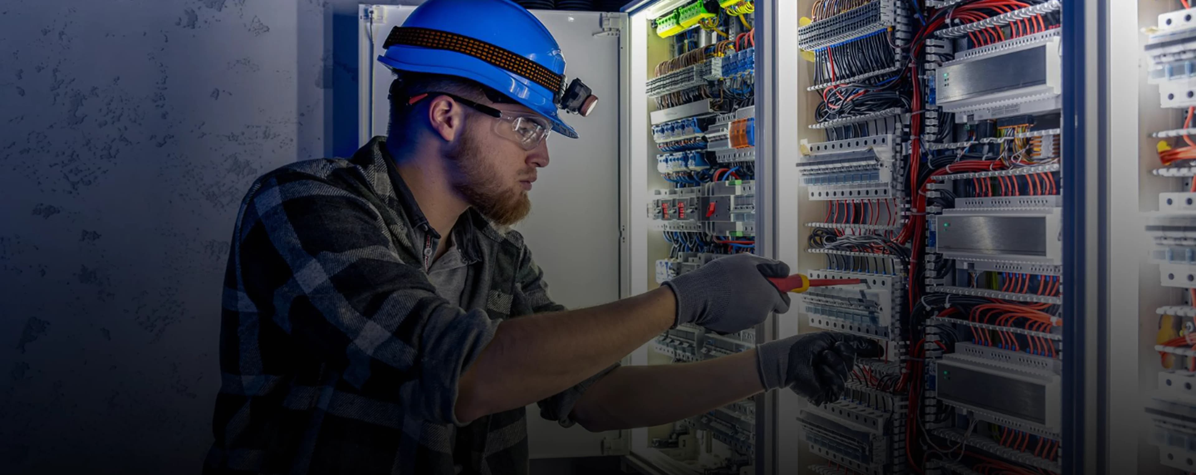 Electrician inspecting a home service panel