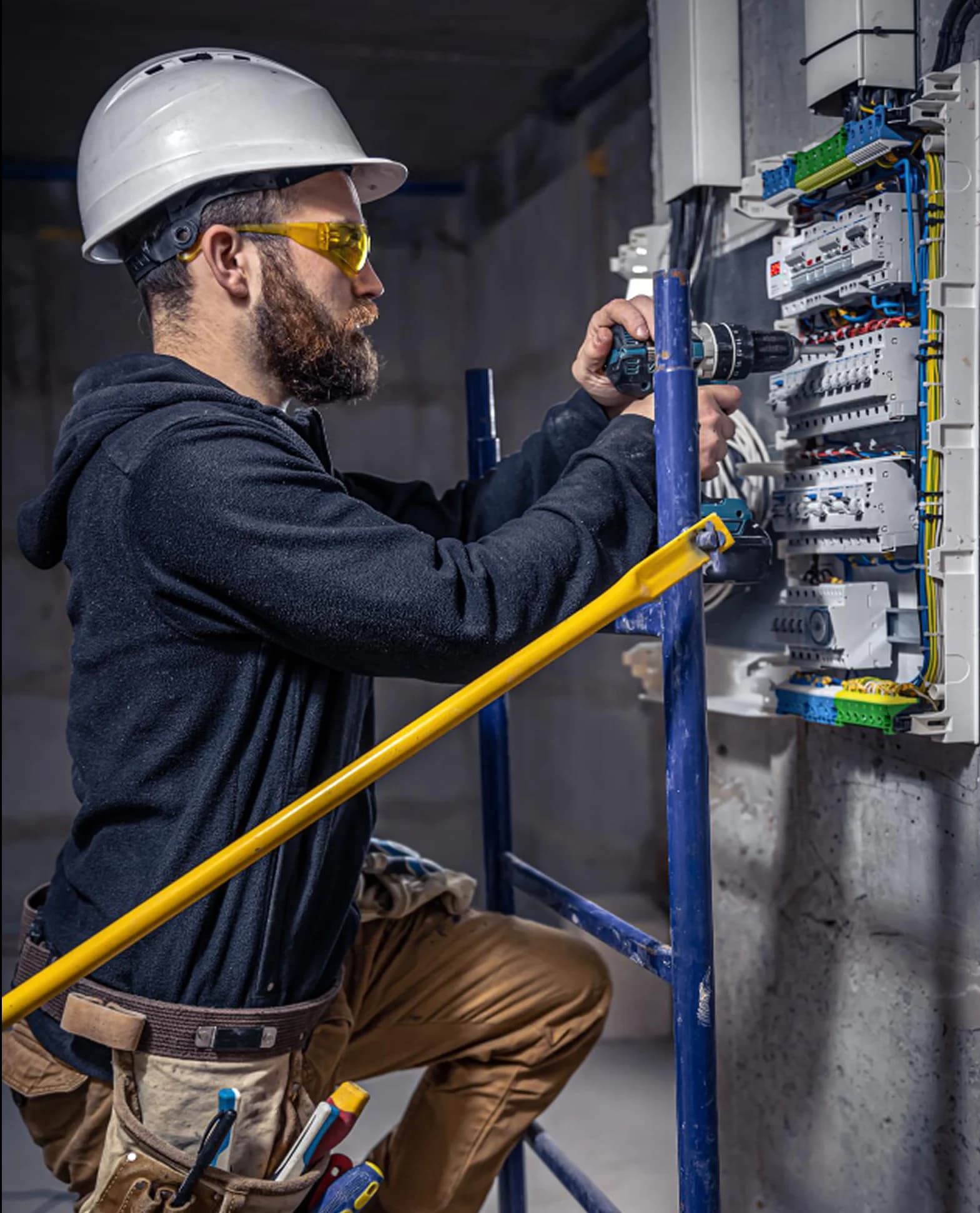 Electrician inspecting home wiring